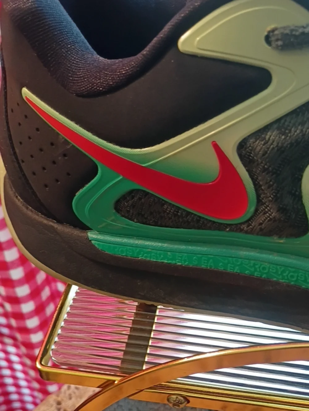 Nike Men’s Black Athletic Shoes with Green and Red Accents